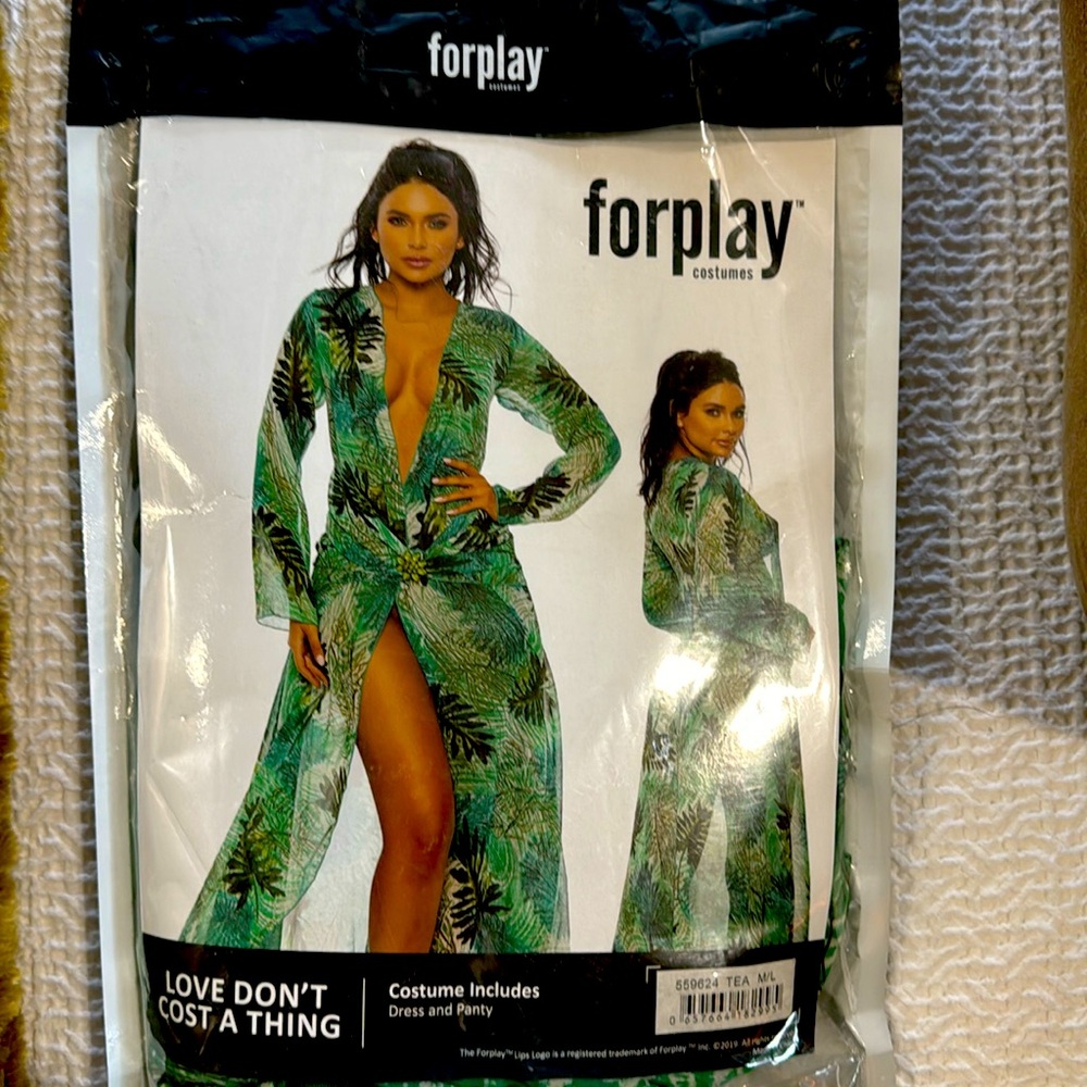 J Lo costume by Forplay includes the dress and the bottoms—it was worn once.